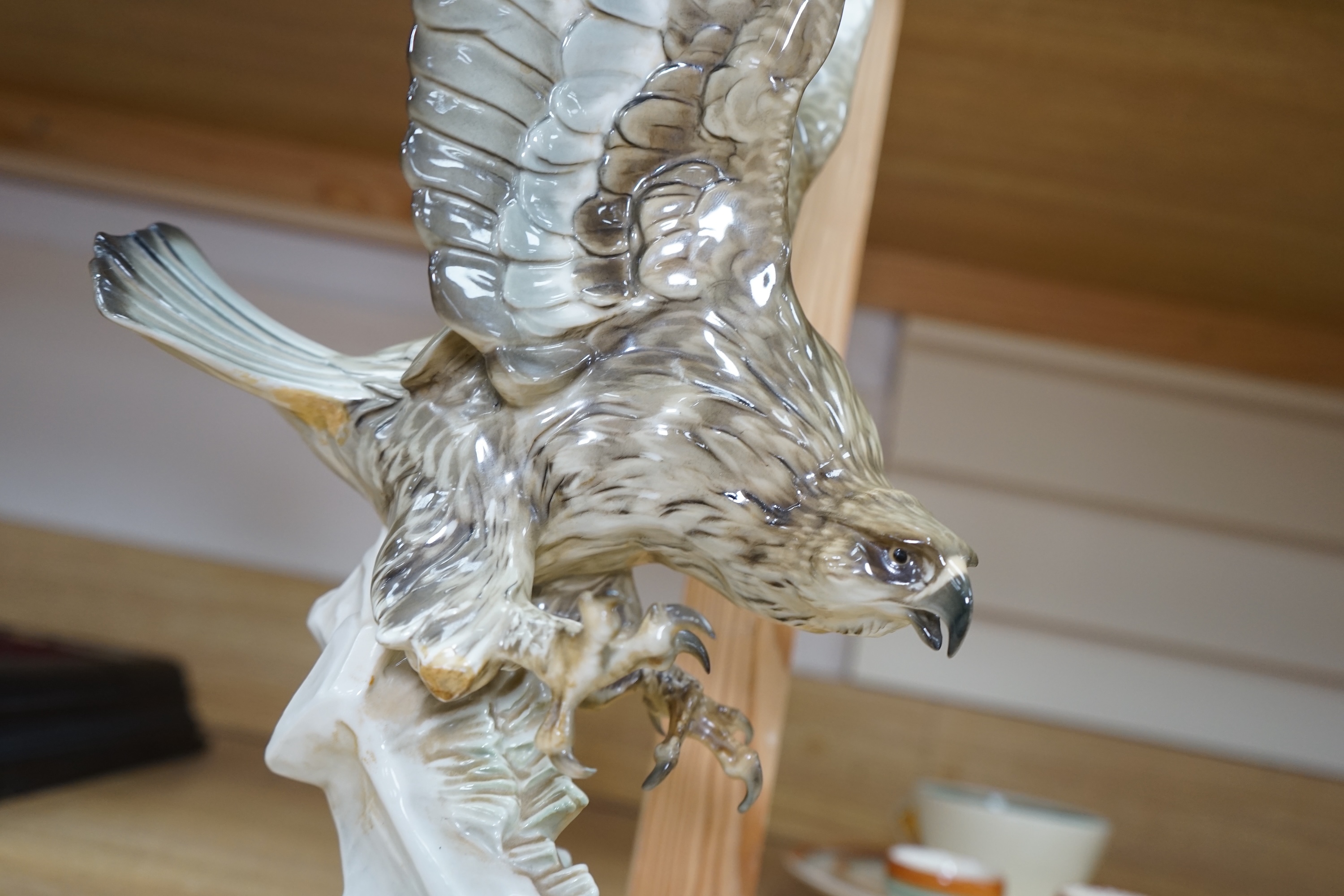 Karl Tutter (1883-1969) for Kutschenreuther, a porcelain model of a hawk, 42cm. Condition - restoration? otherwise good